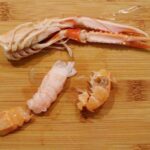 Comment décortiquer une langoustines cuites ?