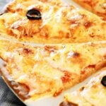 Comment faire une pizza quatre fromages ?