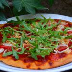 Comment préparer la garniture de pizza ?