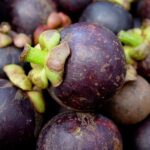 Comment s'appelle le fruit exotique rouge ?